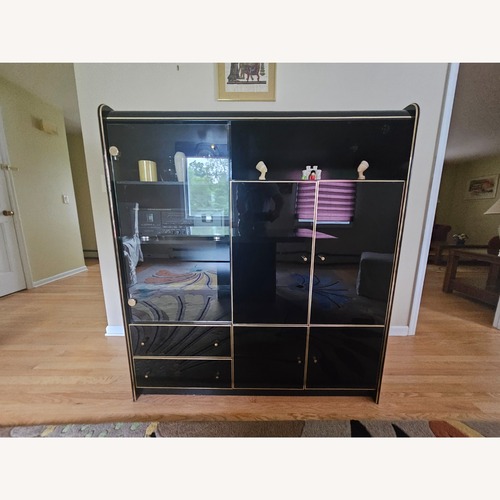 Used Black Lacquer Entertainment Wall Unit for sale on AptDeco