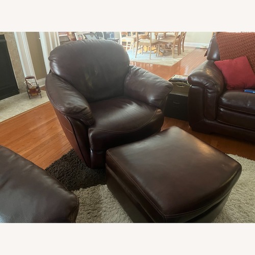 Used Leather Swivel Chair & Ottoman for sale on AptDeco