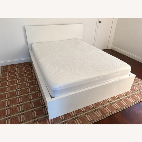 Used IKEA MALM Bed with 4 Storage Boxes for sale on AptDeco