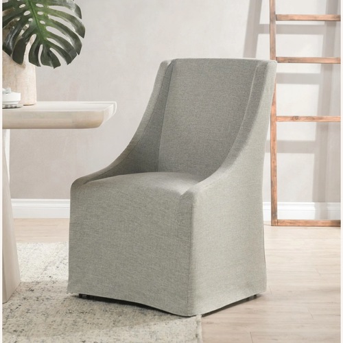 Used Classic Home Upholstered Dining Chair w Casters for sale on AptDeco