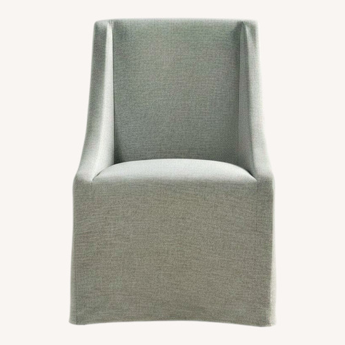 Used Classic Home Upholstered Dining Chair w Casters for sale on AptDeco