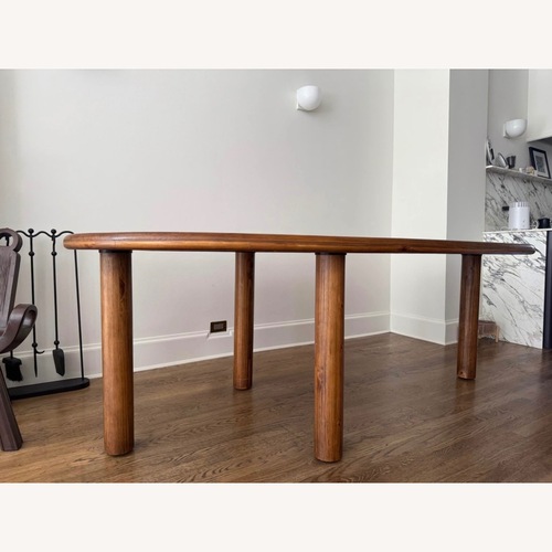 Used Dark Brown Wood Dining Table for sale on AptDeco