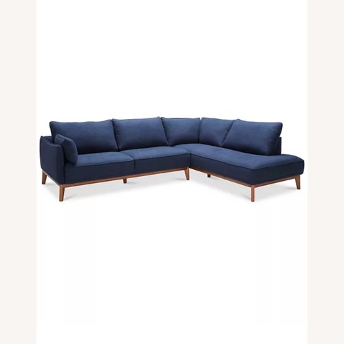 Used Macy's Blue Two Piece Fabric Sectional for sale on AptDeco