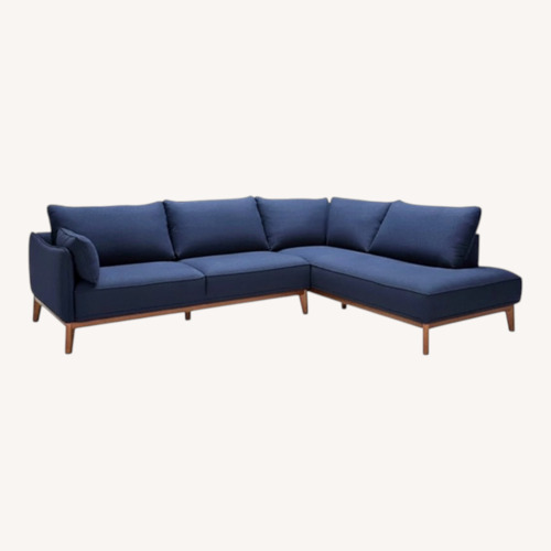 Used Macy's Blue Two Piece Fabric Sectional for sale on AptDeco