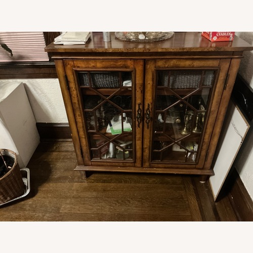 Used Dark Brown Wood Glassdoor Cabinet for sale on AptDeco