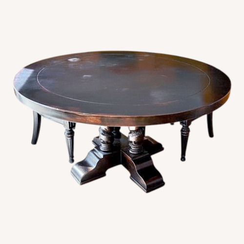 Used Dark Brown Wood Dining Table for sale on AptDeco