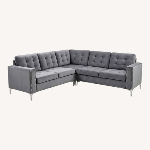 Used Comfy Grey Sectional with Silver Trim for sale on AptDeco