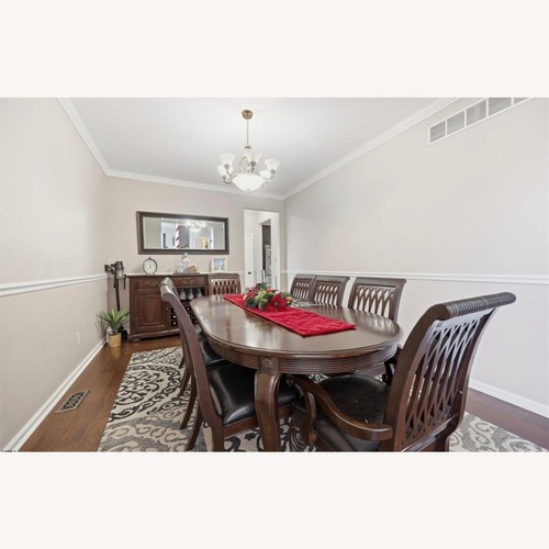 Used 9 piece Dining Room Table  for sale on AptDeco