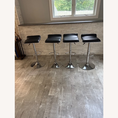 Used Black Vinyl Stools for sale on AptDeco