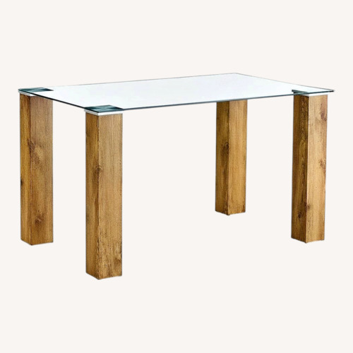Used Raymour & Flanigan Natural Wood Dining Table for sale on AptDeco