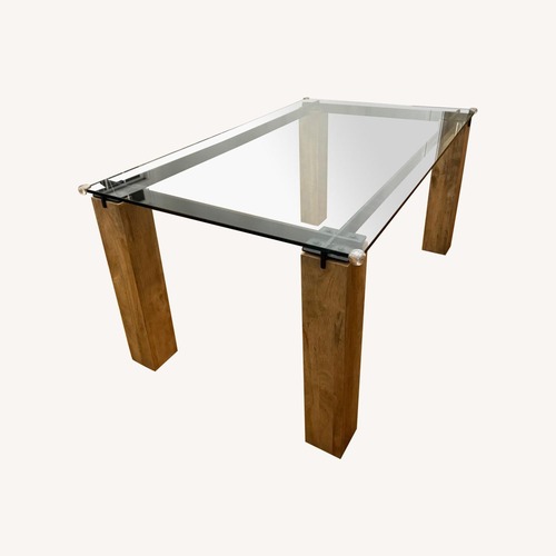 Used Raymour & Flanigan Natural Wood Dining Table for sale on AptDeco