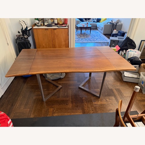 Used Dark Brown Dining Table for sale on AptDeco