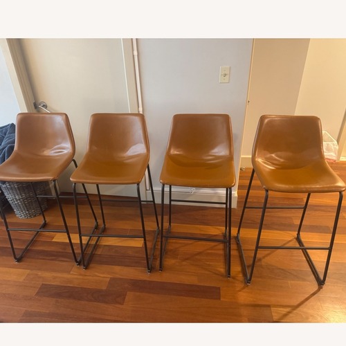 Used Walker Edison Faux Leather Whiskey Brown Bar Stools for sale on AptDeco