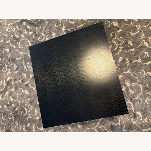 Used Black Wood Coffee Table with Steel Legs for sale on AptDeco
