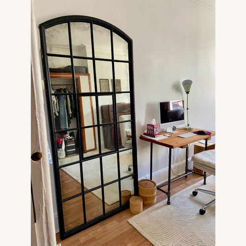 Used Vintage/Antique Black Glass Floor Mirror for sale on AptDeco