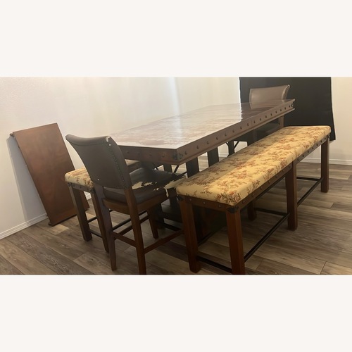 Used Dark Brown Wood Dining Set for sale on AptDeco