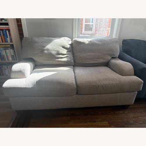 Used Ashley Light Gray Fabric Loveseat for sale on AptDeco