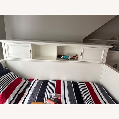 Used Raymour & Flanigan Wood Twin Bed for sale on AptDeco
