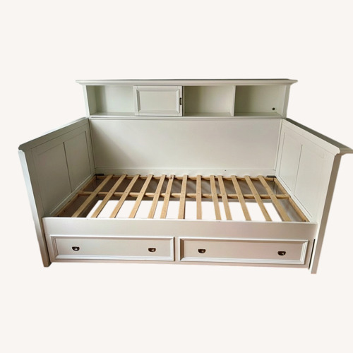 Used Raymour & Flanigan Wood Twin Bed for sale on AptDeco