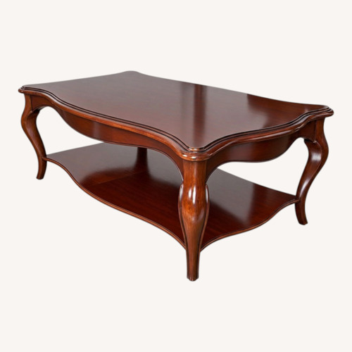 Used Mahogany-Finished Wooden Coffee Table for sale on AptDeco