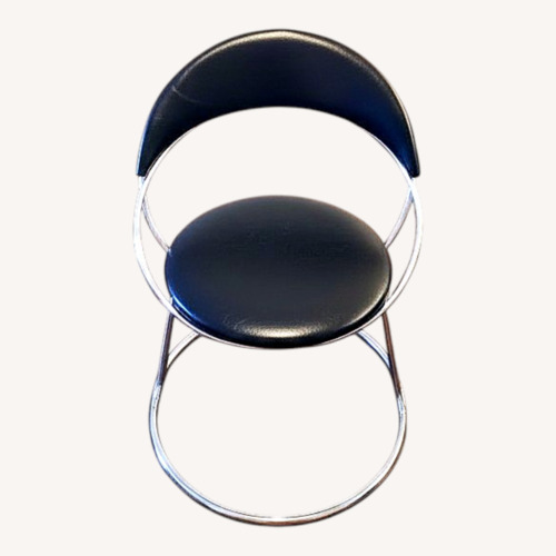 Used Vintage/Antique Finds Black Vinyl Dining Chair for sale on AptDeco