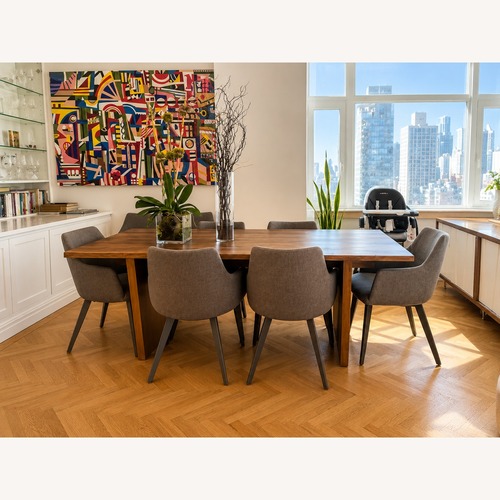 Used Wood Dining Table with 8 Upholstered Chairs for sale on AptDeco