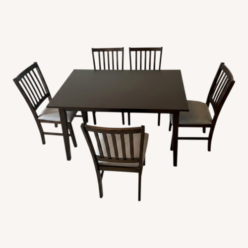 Used Dark Brown Wood Dining Set for sale on AptDeco