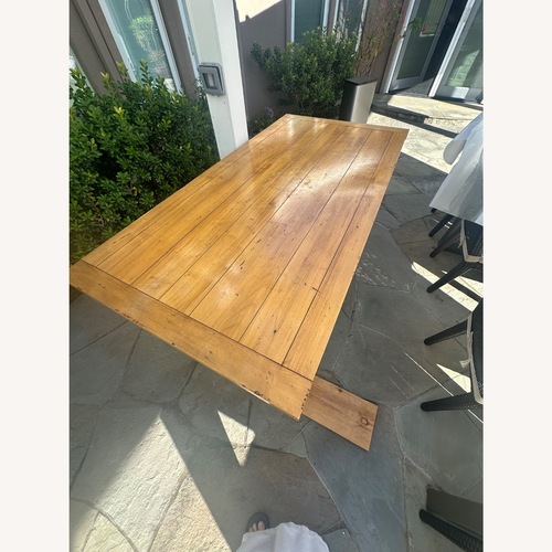 Used Trestle Dining Table for sale on AptDeco