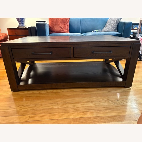 Used Raymour & Flanigan Dark Brown Lambert Rectangular Cocktail Table for sale on AptDeco