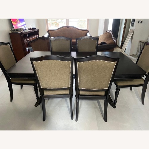 Used Raymour & Flanigan Bay City 7-Piece Dining Set for sale on AptDeco