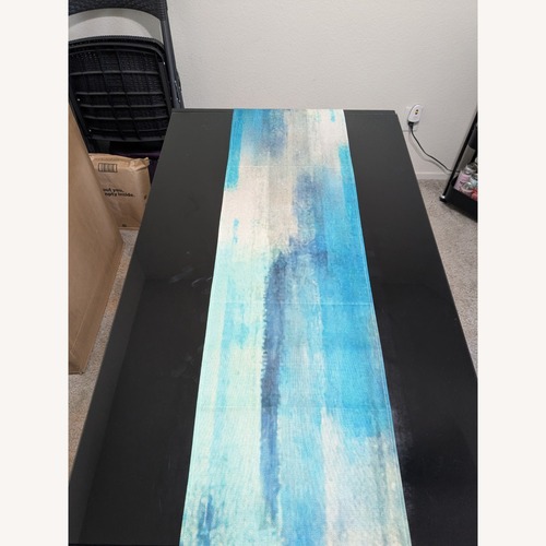 Used Black Glass Top Dining Table for sale on AptDeco