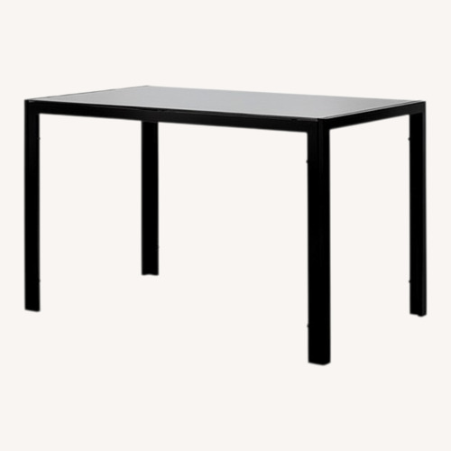 Used Black Glass Top Dining Table for sale on AptDeco