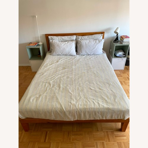 Used ZINUS Natural Wood Queen Bed for sale on AptDeco