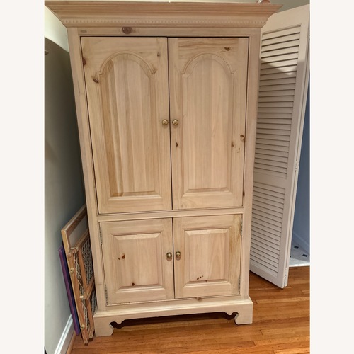 Used Light Pine Amoire for sale on AptDeco