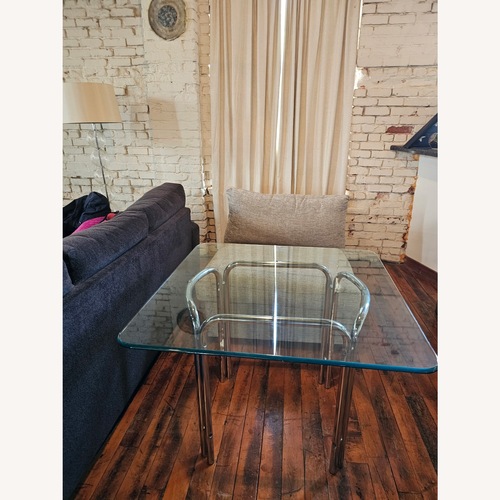 Used Silver Glass Dining Table for sale on AptDeco