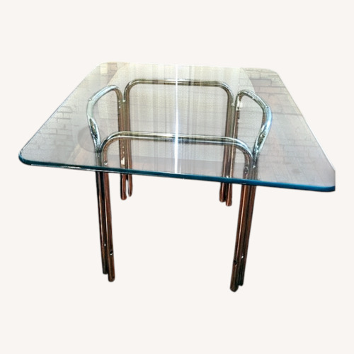 Used Silver Glass Dining Table for sale on AptDeco
