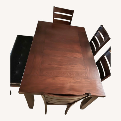 Used Dark Brown Wood Dining Set for sale on AptDeco