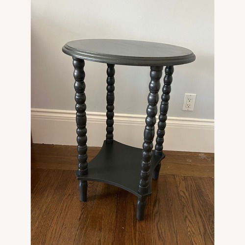 Used Wood Spindle Leg Plant Stand with Shelf	 for sale on AptDeco
