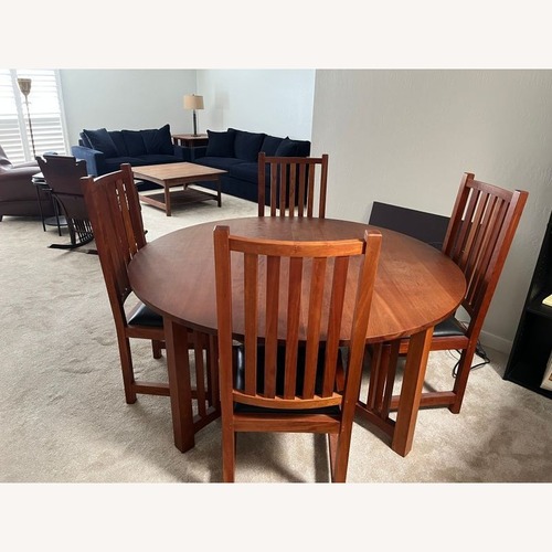 Used Thos Moser Cherry Wood 9Piece Extendable Dining Set for sale on AptDeco