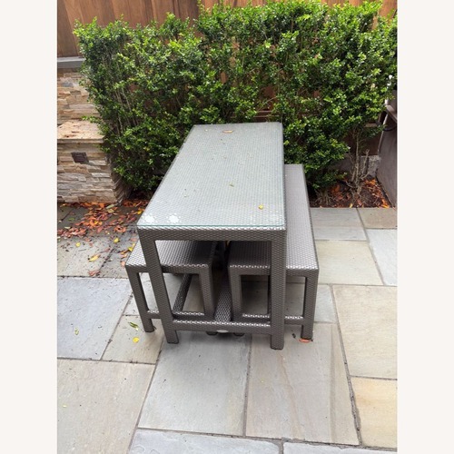 Used Dedon 4-Piece Outdoor Rattan Dining Table  for sale on AptDeco