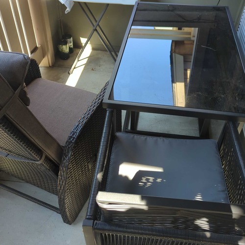 Used Outdoor Grey Recliner Chair with Woven Armrests for sale on AptDeco