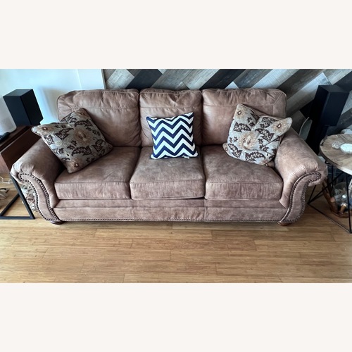 Used Light Brown Leather 2 Seater Sofa for sale on AptDeco