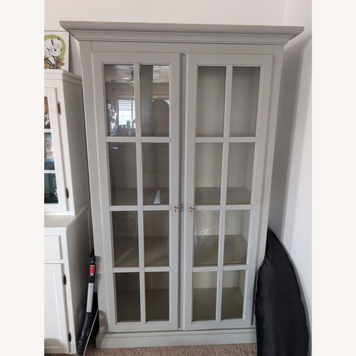 Used Crate & Barrel Cameo Glass Door Bookshelf  for sale on AptDeco