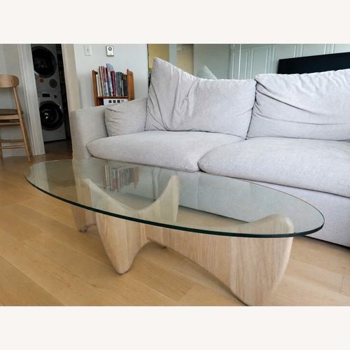 Used Room & Board Oval Sanders Coffee Table for sale on AptDeco