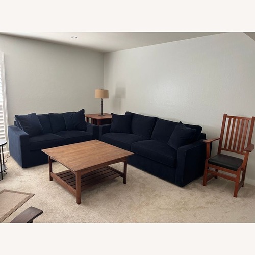 Used Wood Coffee Table with Slatted Shelf for sale on AptDeco