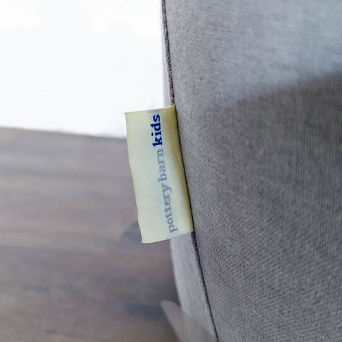 Used Pottery Barn Kids Hart Light Grey Swivel Lounge Chair for sale on AptDeco
