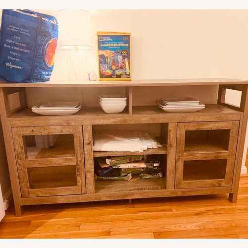 Used  Entertainment Center with Glass Doors for sale on AptDeco