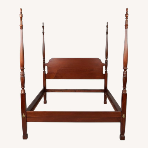 Used Dark Brown Wood 4 Post QueenBed for sale on AptDeco