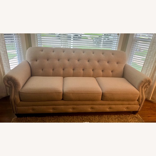 Used Ashley Furniture Kieran Natural Fabric 3+ Seater Sofa for sale on AptDeco