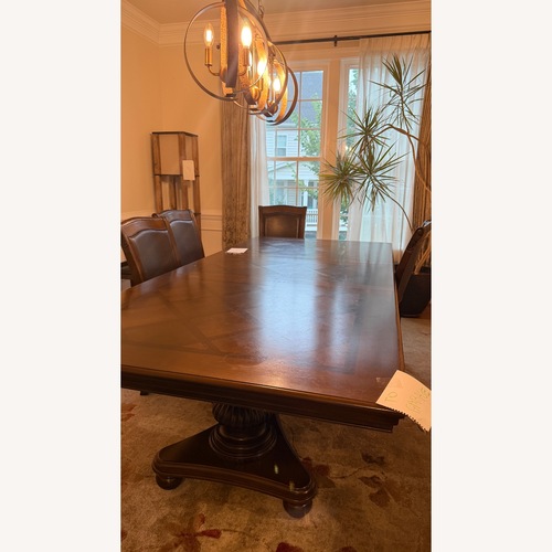 Used Dining Table with 6 Chairs- Solid Wood Material  for sale on AptDeco